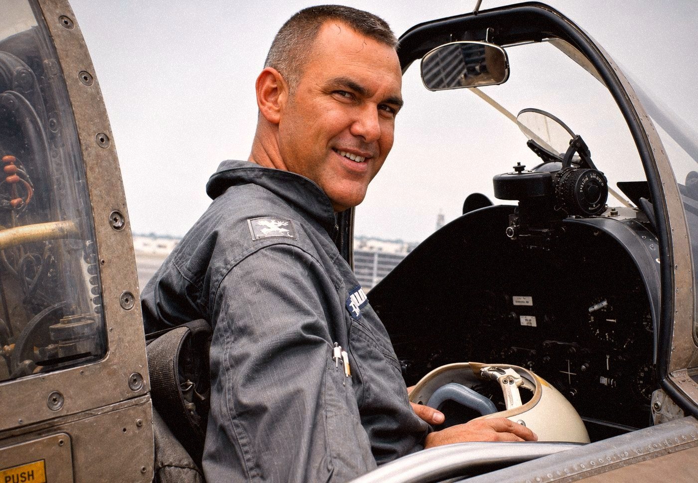 Colonel Jack Blacker in the cockpit of his F-86 Sabre fighter jet